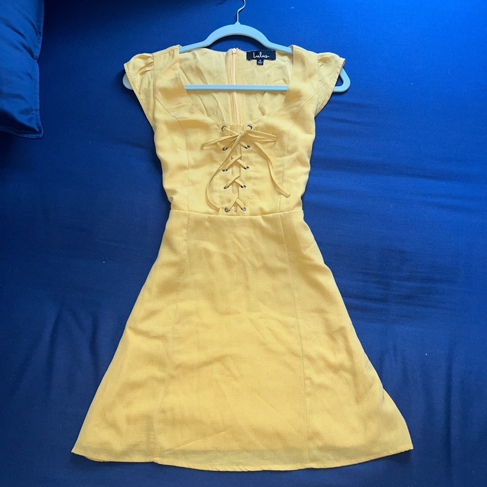 yellow lace-up mini dress